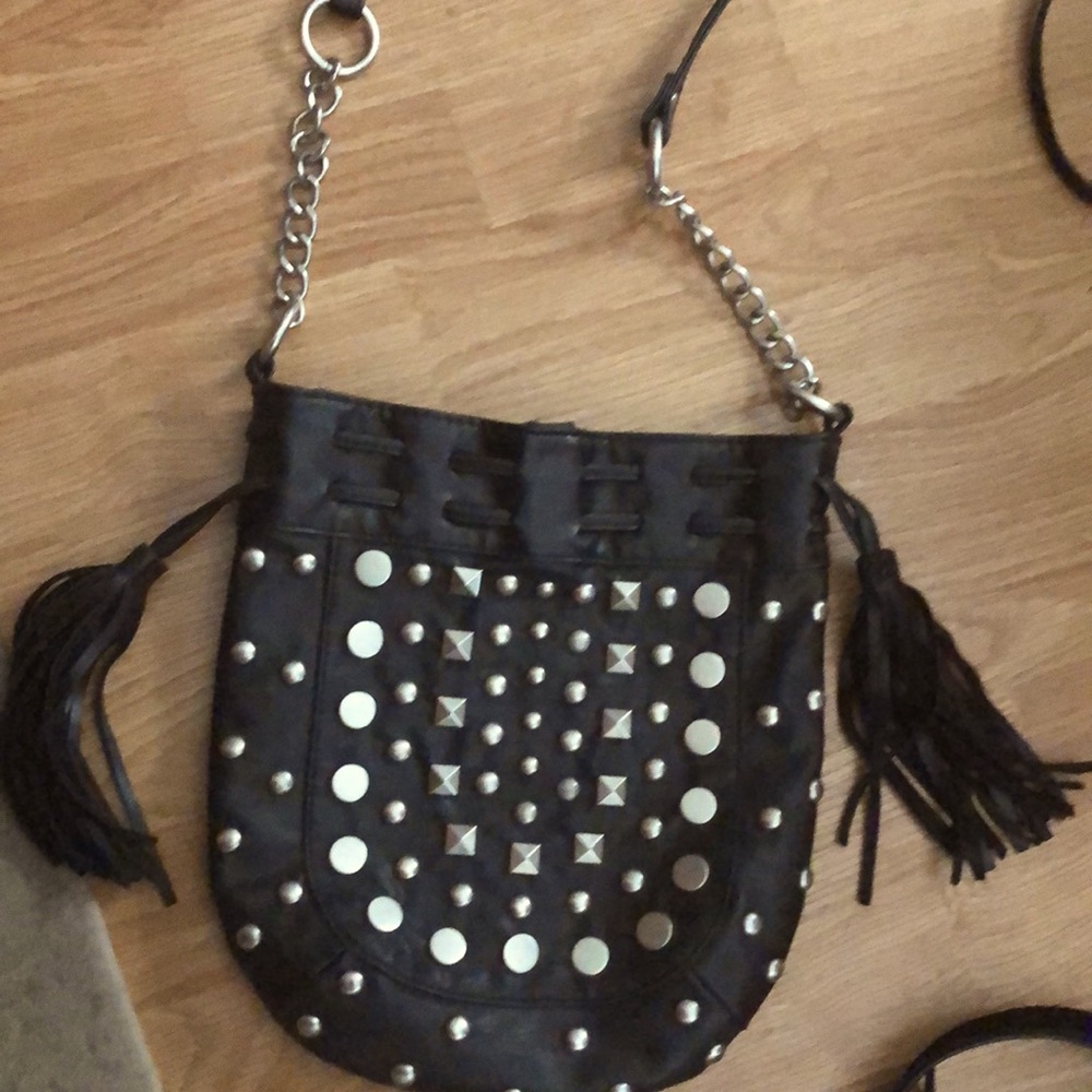 Chateau edgy crossbody bag with silver.